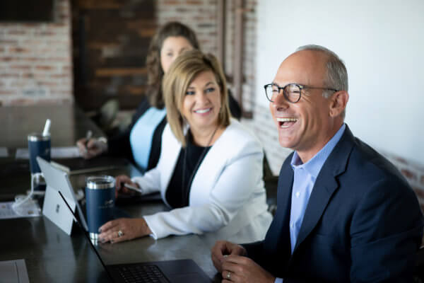 Eric Handler laughing with Team Handler, executive search firm in Atlanta.