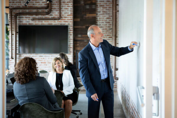 Eric in a meeting with Team Handler