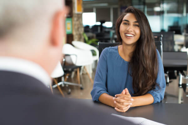 Woman talking about hiring for a new role