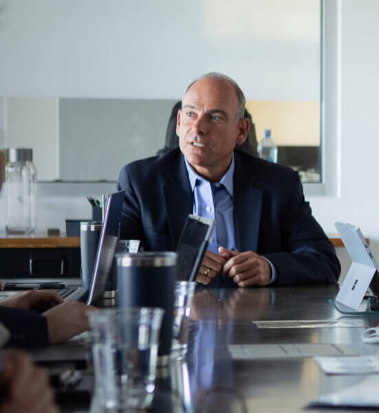 Eric Handler at the conference table